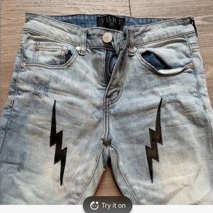 Thrt Light Blue Distressed Jeans with Black Lightning Design